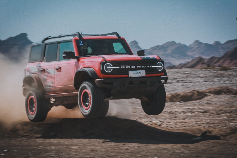 A red car in the air AI-generated content may be incorrect.